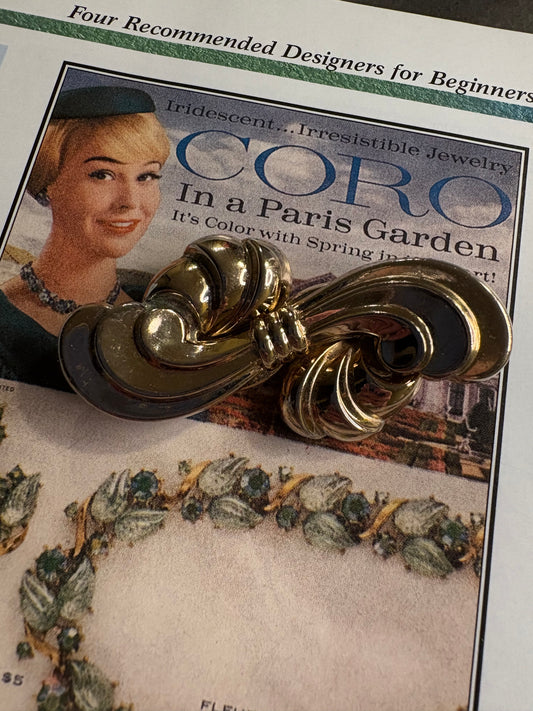 Spilla Coro