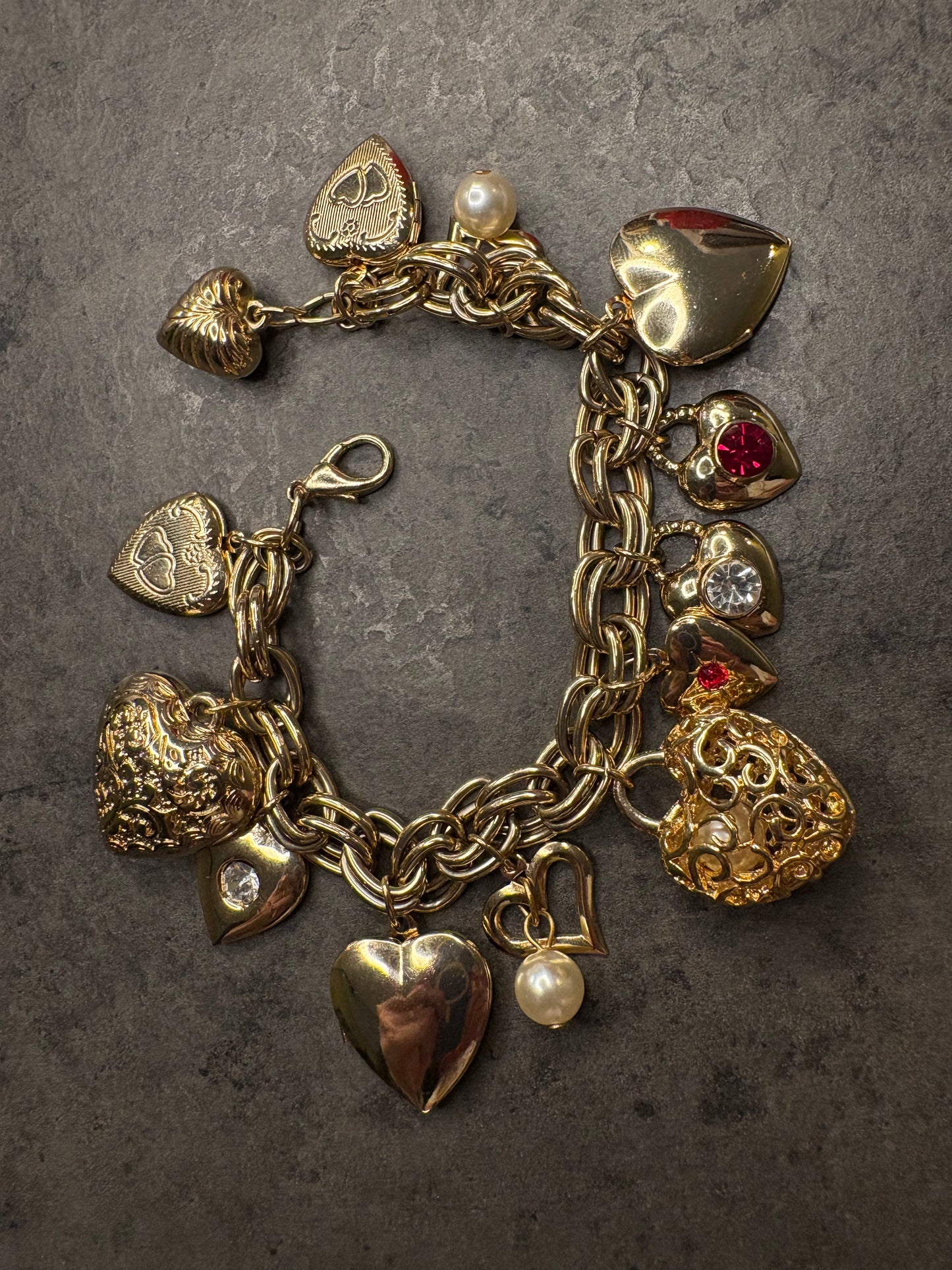 Bracciale vintage con charm a cuore e locket