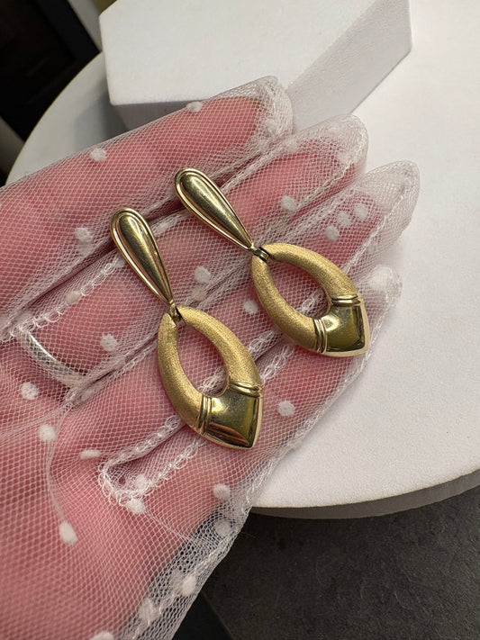 Orecchìni in Amerikaner