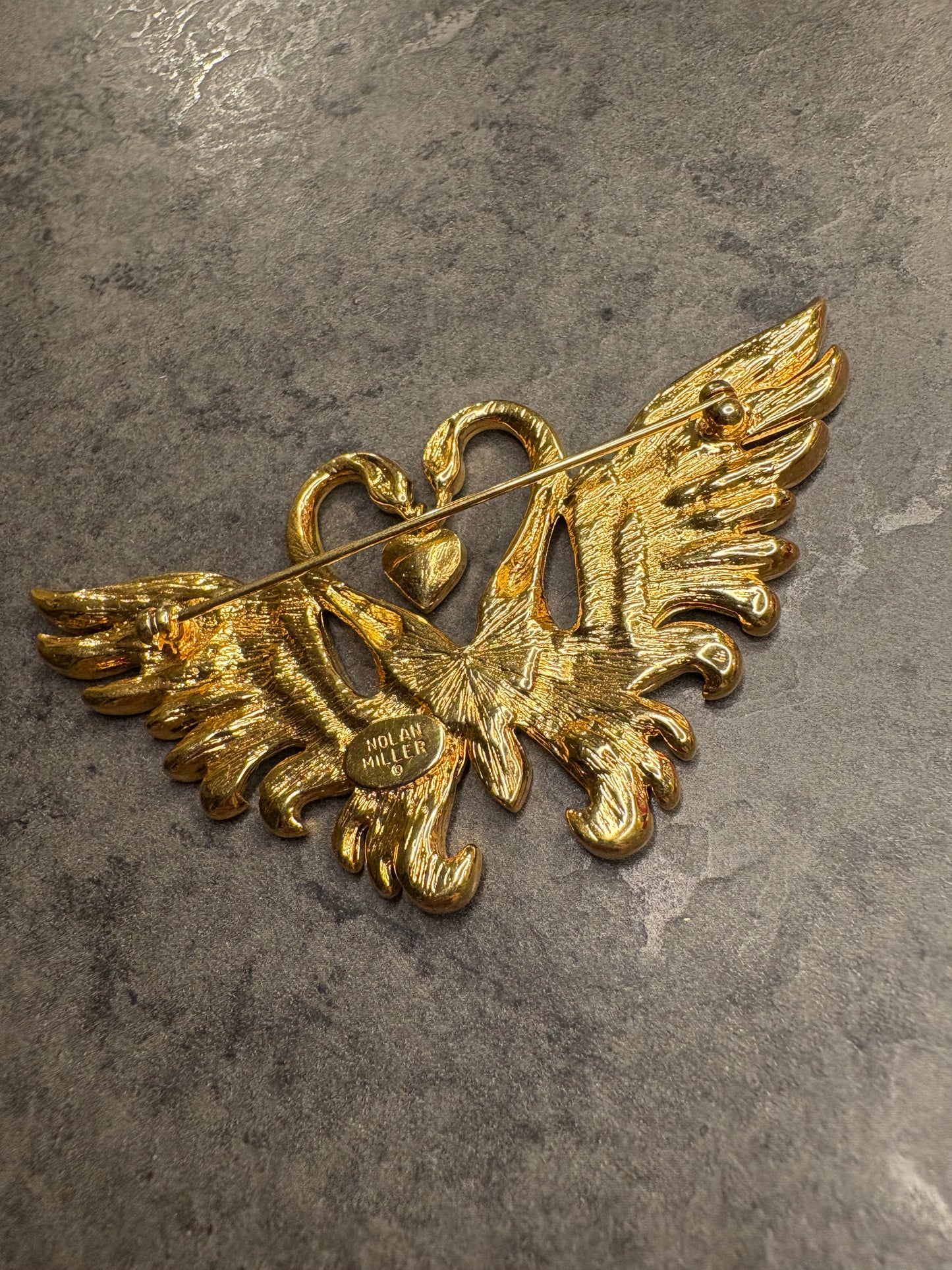 Spilla Nolan Miller