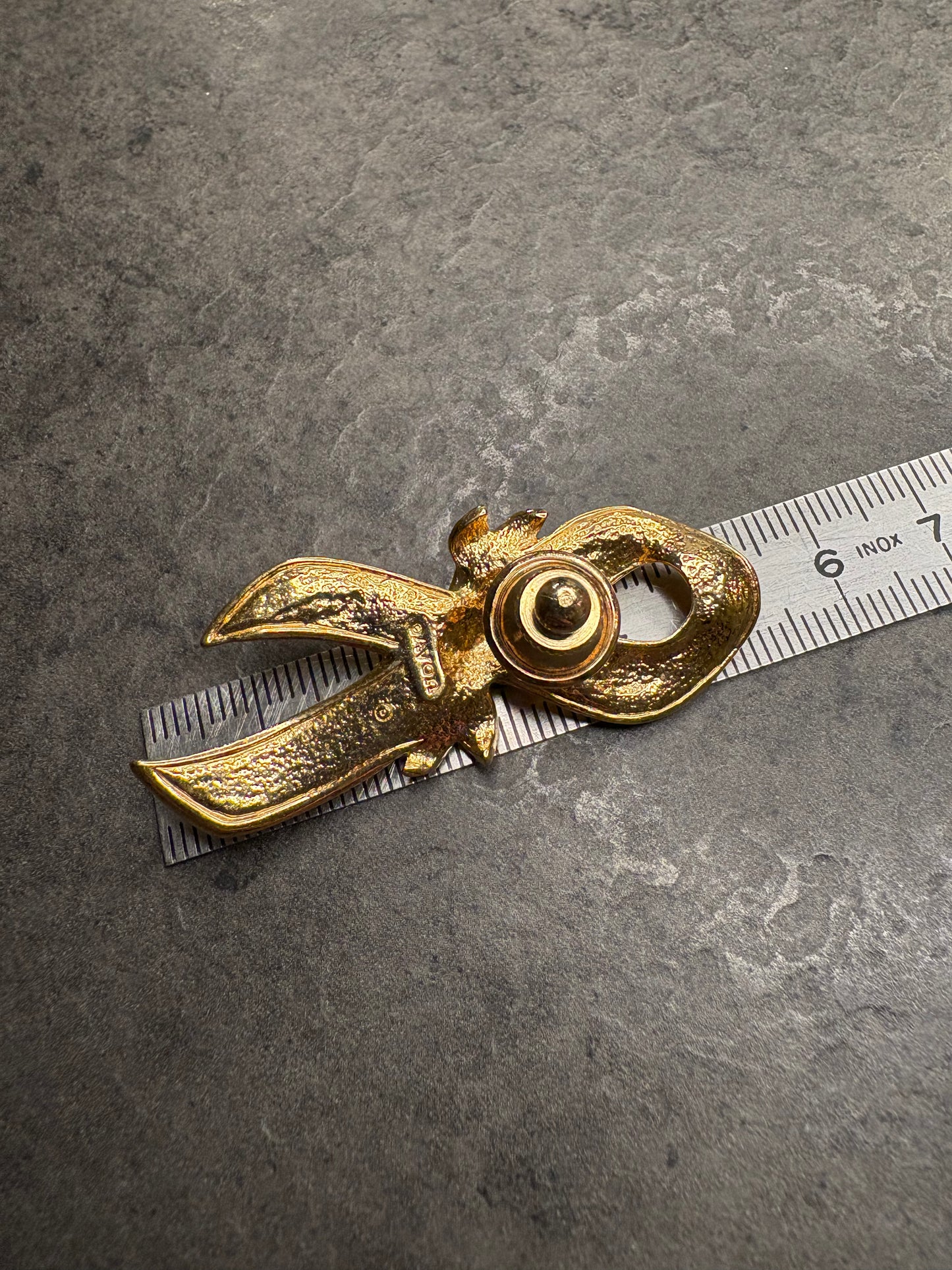 Pin e Orecchini Avon