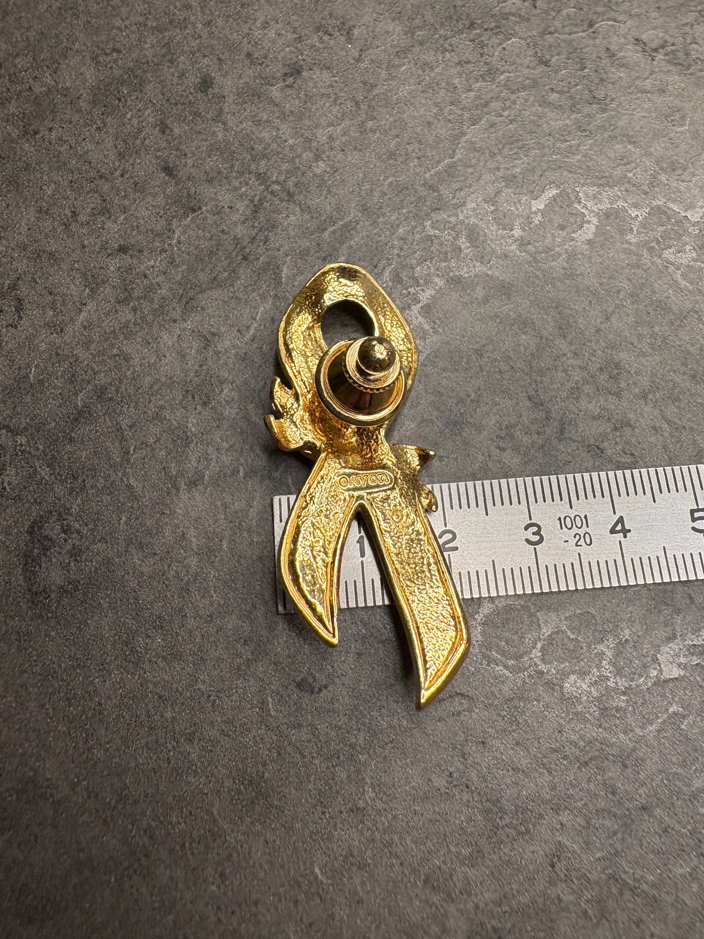 Pin e Orecchini Avon